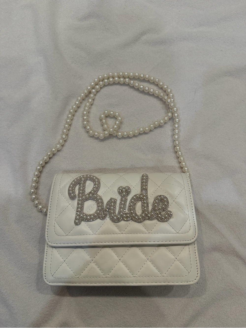 White quilted bridal clutch bag